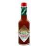 A clear glass bottle of McIlhenny's Tabasco Chipotle Pepper Sauce