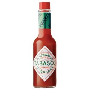 A glass bottle of McIlhenny's Tabasco sauce